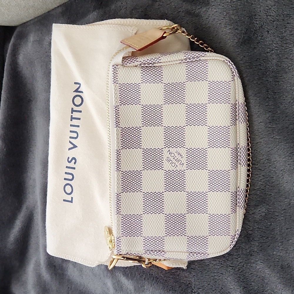 Authentic mini pochette accessoires da